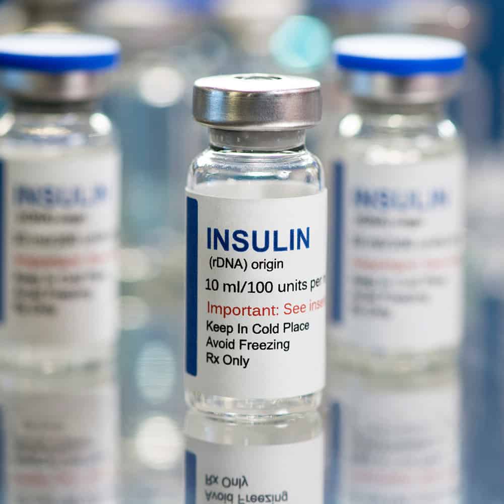 insulin bottles on table