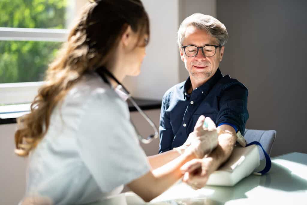 Patient Blood Draw by Doctor.